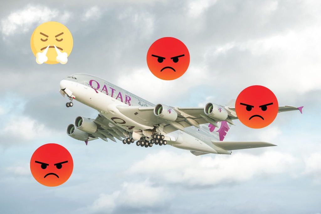 A Qatar Airways plane in the air with angry emojis all around it