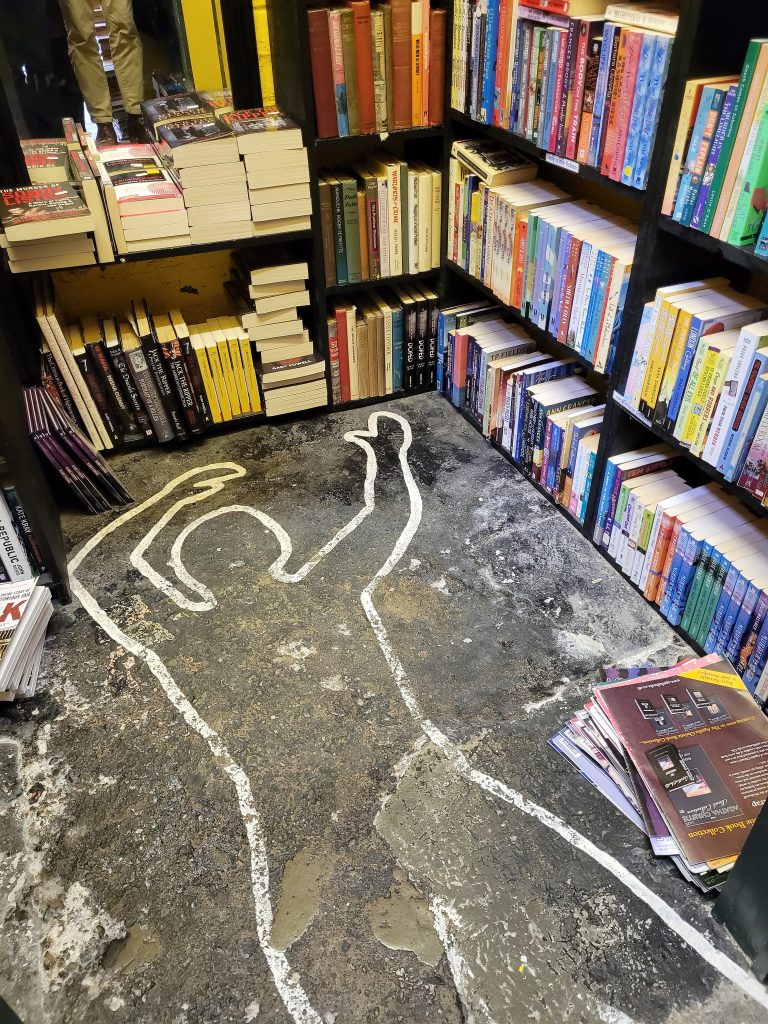 A joke body outline in Murder and Mayhem's bookshop in Hay on Wye